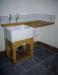 Belfast Sink on Stand. Primitive and basic with wooden drainer in utility      
